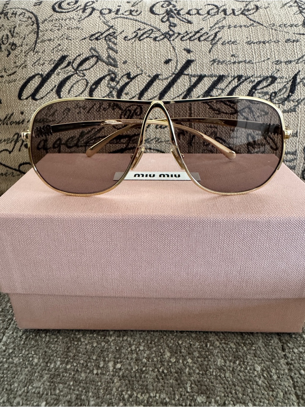 Miu Miu Gold and Black Temple Sunglasses Arm